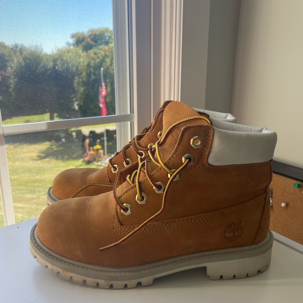 Kids Timberland boots size 2, worn once but were too small.